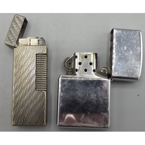 95 - Dunhill silver plated butane cigarette lighter US.RE 24163 Patented, H6.3cm and a Zippo chrome plate... 