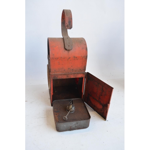 142 - Railway paraffin lamp, white BR(W) example (height with handle raised approx 53cm) and a red painted... 