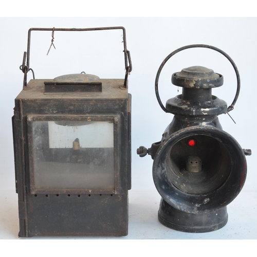 143 - A box style BR(M) railway lamp (height with handle stowed 31.3cm) and Lucas No745 