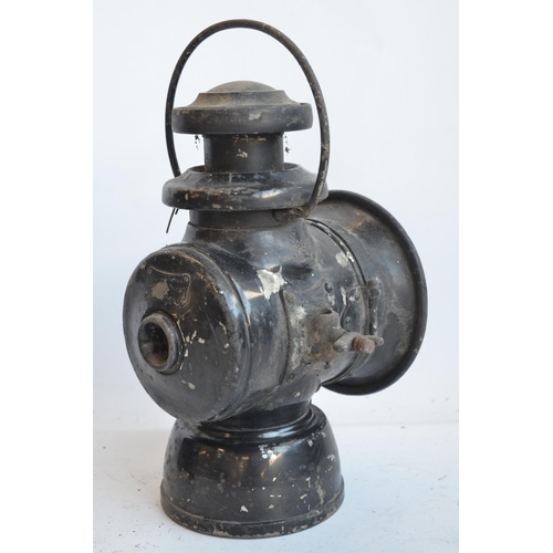 143 - A box style BR(M) railway lamp (height with handle stowed 31.3cm) and Lucas No745 