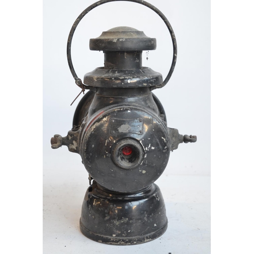 143 - A box style BR(M) railway lamp (height with handle stowed 31.3cm) and Lucas No745 