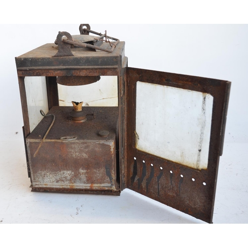 143 - A box style BR(M) railway lamp (height with handle stowed 31.3cm) and Lucas No745 