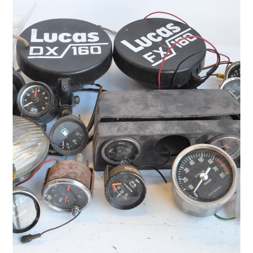 144 - Collection of mostly C1960's-modern car lamps (to include Lucas), a plastic car dash, instruments et... 