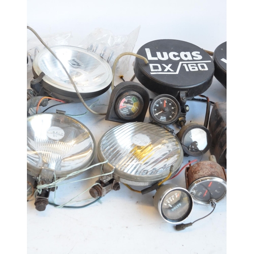 144 - Collection of mostly C1960's-modern car lamps (to include Lucas), a plastic car dash, instruments et... 