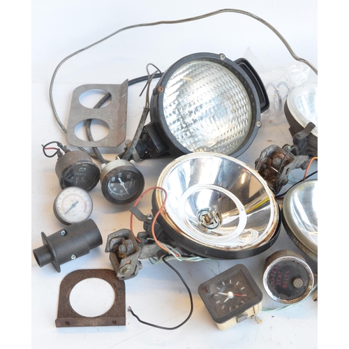 144 - Collection of mostly C1960's-modern car lamps (to include Lucas), a plastic car dash, instruments et... 