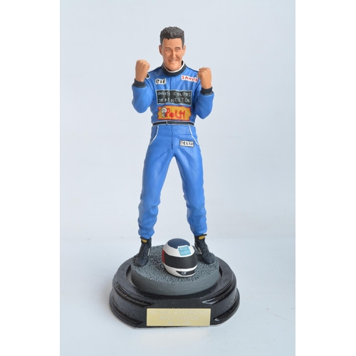 150 - Two hand painted cold cast porcelain figurines of Michael Schumacher, one with shipping box and limi... 