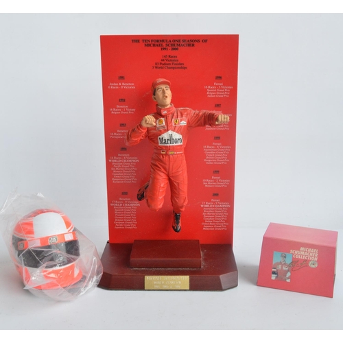 151 - Hand painted cold cast 1/9th scale porcelain figurine of Michael Schumacher by Sheercast  with mahog... 