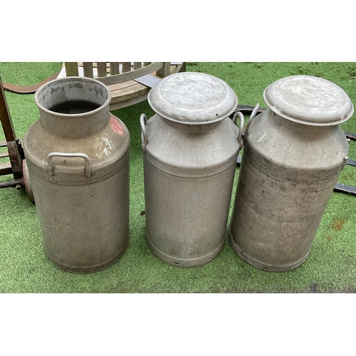 1250 - Three galvanised milk churns. One missing a lid (3) one by Swiftcan