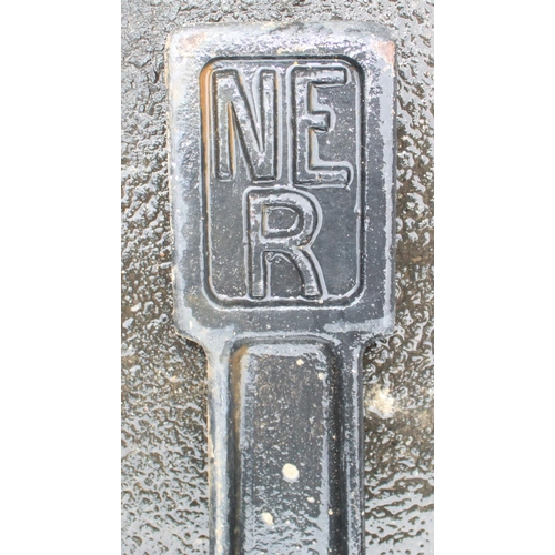 1224 - Cast iron N.E.R. rail sign. H107cm. (Corner piece missing from stand)