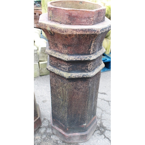 1238 - Two Octagonal salt glazed chimney pots and two square terracotta pots. 80cm