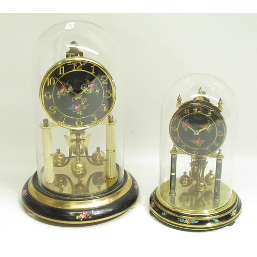 552 - Kern brass 400 day suspension timepiece with painted floral decoration 4 1/2' Arabic dial under glas... 