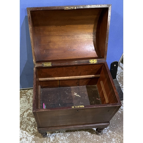 593 - C19th mahogany dome top cellarette, outlined with satinwood band on ring turned tapered legs with br... 