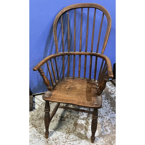 435 - C19th ash and elm stick back Windsor arm chair, on turned supports with stretchers