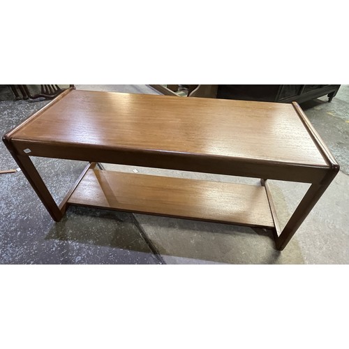 575 - Mid-Century teak rectangular coffee table, on open end supports with stretcher, W96cm D43cm H 43cm