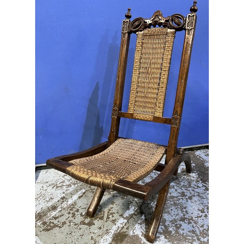 596 - Victorian walnut framed folding chair carved detail with pierced cresting and canework seat and back... 