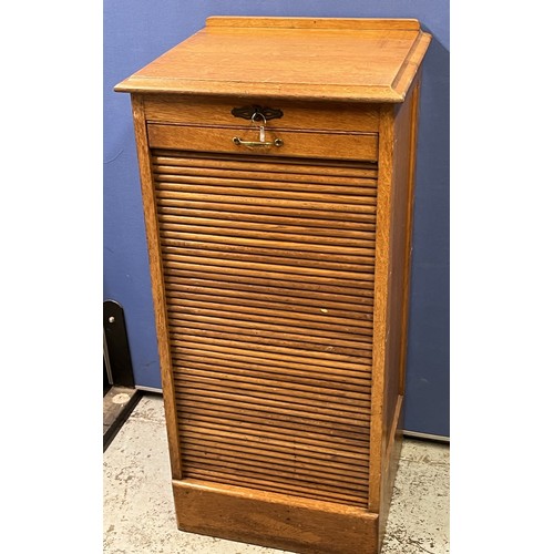 604 - C20th Wm. Richardson of Leeds oak office filing cabinet, tambour front with nine drawers with brass ... 