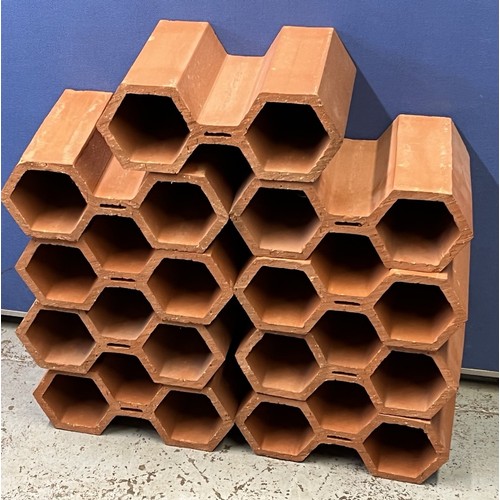 608 - Nine clay double hexagonal drainage pipes, W32cm D24cm (9)