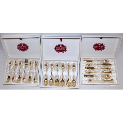 244 - Three boxed sets of Royal Albert Old Country Roses gold plated cutlery