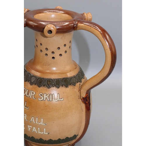 250 - C19th Doulton Lambeth stoneware puzzle jug, 'Here gentlemen come try your skill, I'll hold a wager i... 