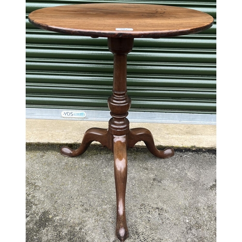 581 - George 111 mahogany tripod table, circular snap top on baluster column, top D56cm