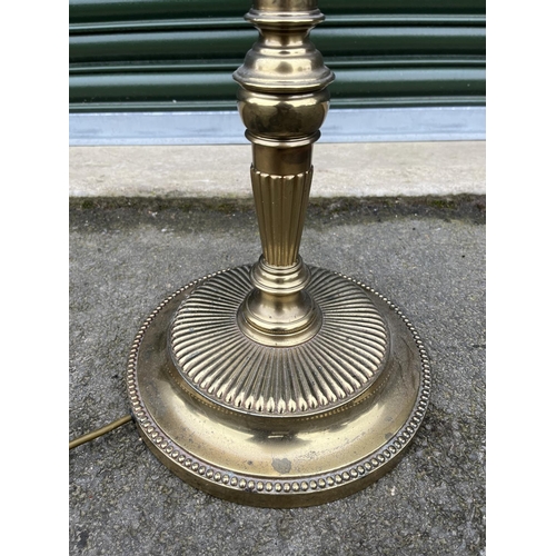 583 - Regency style brass three branch floor lamp, on lobed circular base, H152cm