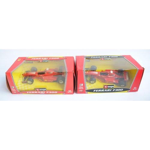 157 - Five 1/24 scale Ferrari Formula 1 racing cars to include F300 1998, F310B etc. All models in mint co... 