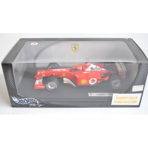 159 - Two 1/18 scale diecast Michael Schumacher Collection F1 Ferrari F2001 models from Hot Wheels Racing ... 