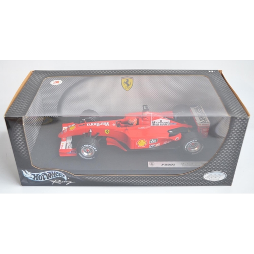 159 - Two 1/18 scale diecast Michael Schumacher Collection F1 Ferrari F2001 models from Hot Wheels Racing ... 