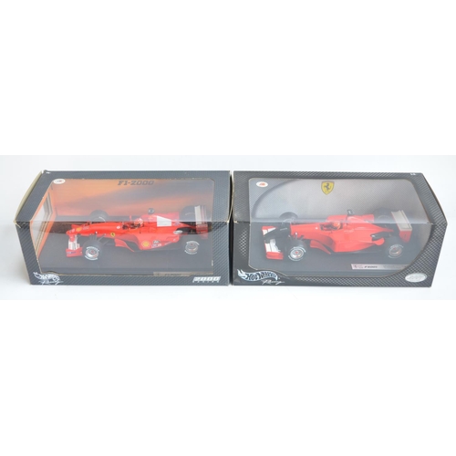 160 - Two 1/18 scale diecast Michael Schumacher Collection F1 Ferrari models from Hot Wheels Racing with s... 