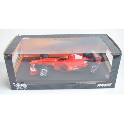 160 - Two 1/18 scale diecast Michael Schumacher Collection F1 Ferrari models from Hot Wheels Racing with s... 