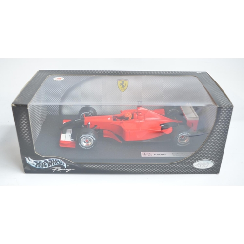 160 - Two 1/18 scale diecast Michael Schumacher Collection F1 Ferrari models from Hot Wheels Racing with s... 