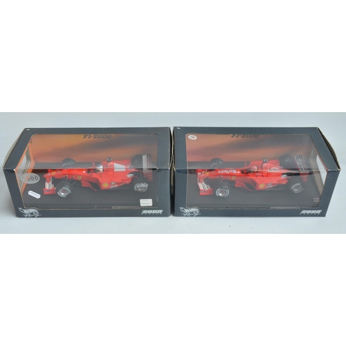 161 - Two 1/18 scale diecast F1 Ferrari F1-2000 models from Hot Wheels Racing with seated driver figures t... 