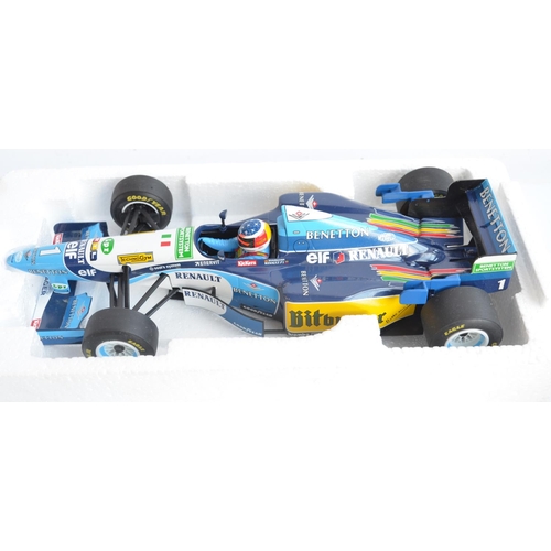 164 - Two 1/18 scale diecast Michael Schumacher Formula 1 racing car models to include Minichamps 100 9100... 