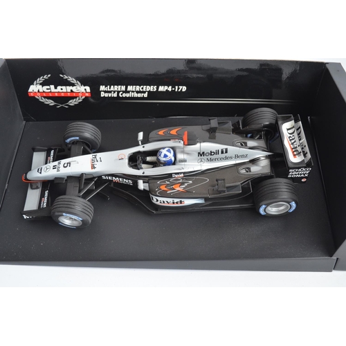 168 - Two 1/18 scale diecast F1 David Coulthard McLaren Mercedes models from Minichamps/Paul's Model Art w... 