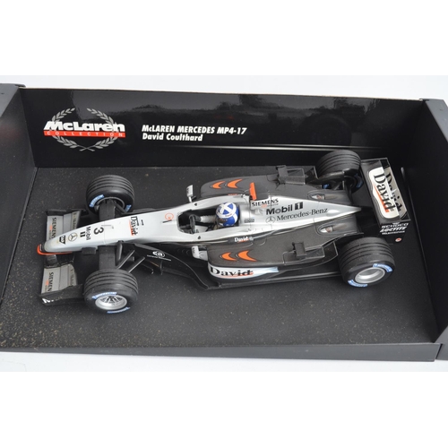 168 - Two 1/18 scale diecast F1 David Coulthard McLaren Mercedes models from Minichamps/Paul's Model Art w... 