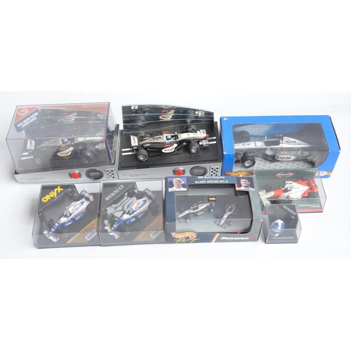 171 - Collection of plastic and diecast David Coulthard themed Formula 1 racing car models to include 2 Au... 