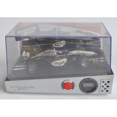 171 - Collection of plastic and diecast David Coulthard themed Formula 1 racing car models to include 2 Au... 