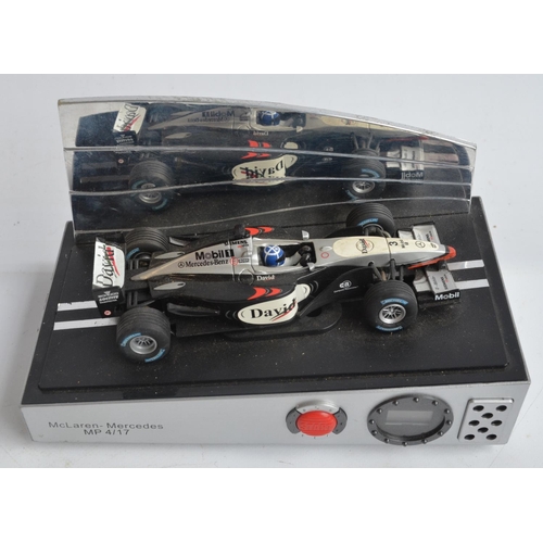 171 - Collection of plastic and diecast David Coulthard themed Formula 1 racing car models to include 2 Au... 