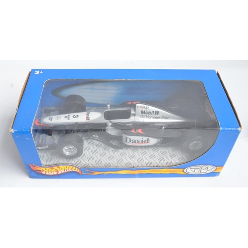 171 - Collection of plastic and diecast David Coulthard themed Formula 1 racing car models to include 2 Au... 