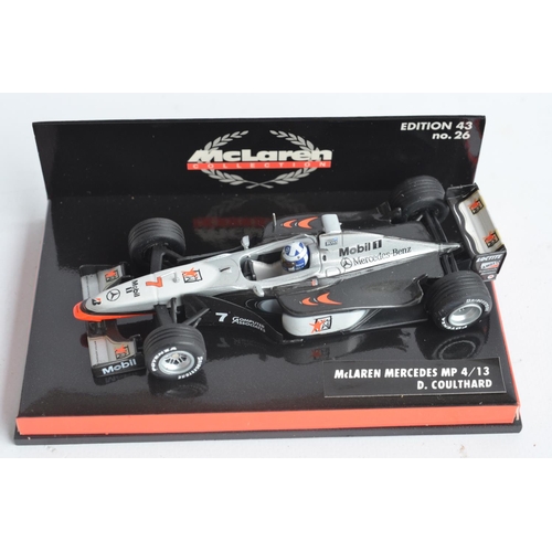 172 - Eight boxed 1/43 scale diecast David Coulthard themed Formula 1 racing car models from Paul's Model ... 