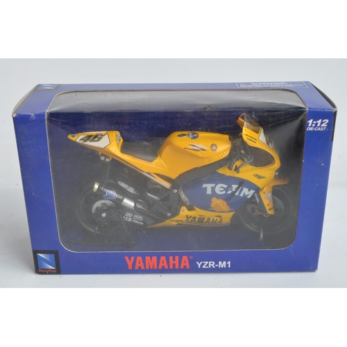 174 - Collection of diecast racing motorbike models, various scales and manufacturers to include 3x Valent... 