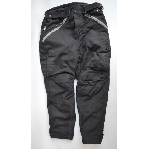 192 - Three pairs of bikers trousers to include Belstaff Cordura Stormshield XL with armour, another pair ... 