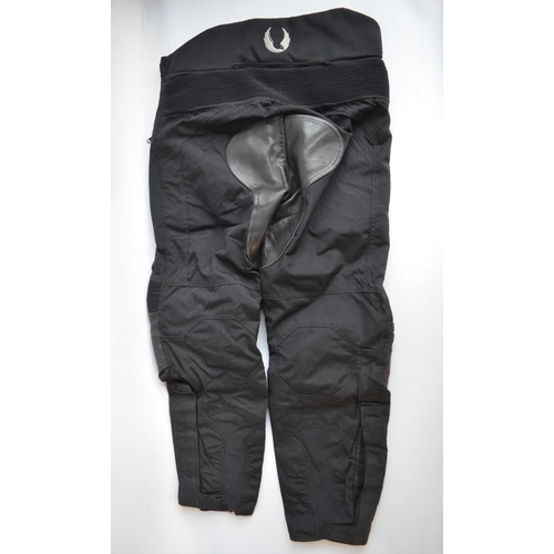 192 - Three pairs of bikers trousers to include Belstaff Cordura Stormshield XL with armour, another pair ... 