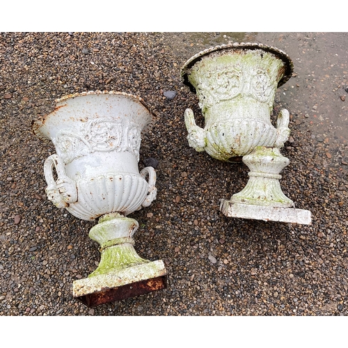 1276 - A pair of Victorian cast iron urns with floral design and masked handles approximately 60cm A/F