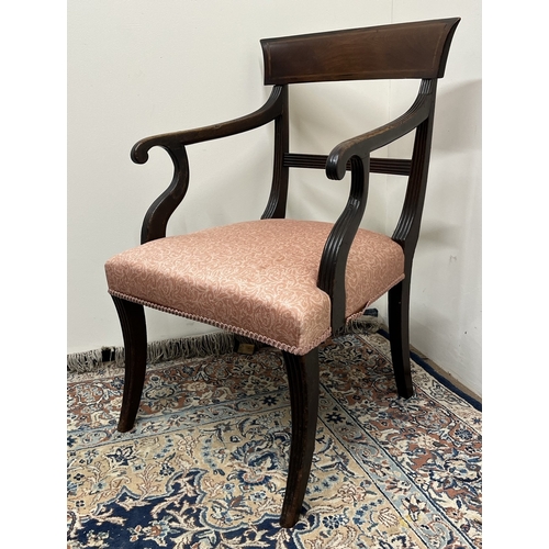 482 - Regency inlaid mahogany elbow chair, with reeded frame and stuffer over seat on sabre legs