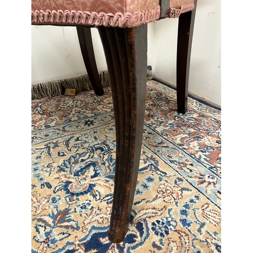 482 - Regency inlaid mahogany elbow chair, with reeded frame and stuffer over seat on sabre legs