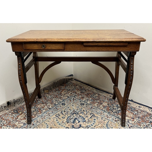 484 - Victorian oak rectangular writing table, with frieze drawer and slide, on carved scroll supports, W8... 