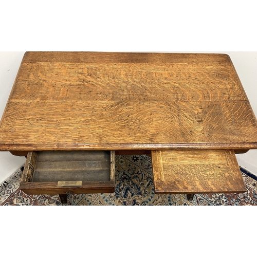 484 - Victorian oak rectangular writing table, with frieze drawer and slide, on carved scroll supports, W8... 