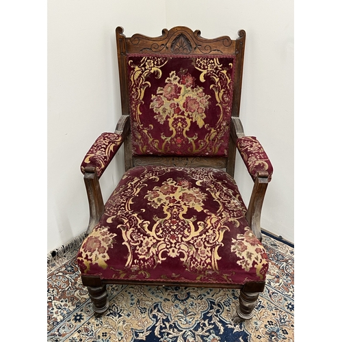 487 - Edwardian upholstered open arm chair, on turned supports