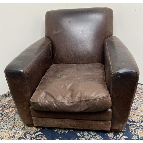 490 - Club type brown leather upholstered arm chair, with loose seat cushion, W87cm D88cm H80cm and matchi... 